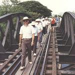Many tourists cross the "Bridge over the River Kwai" on foot before they get on the train to be transported in a manner that can bring out nostalgic feelings in any real boy - not least those who are a little bigger and older. 16,000 allied prisoners of war lost their lives when they were forced to build the railway and the bridge. At least 100,000 Asiatic slave labourers died.