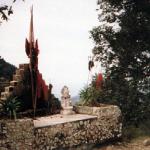 Himachal Pradesh, India. Shrines are everywhere in India, and may consist of so little as this one, found on a road overlooking the Himalayan mountains of India's Himachal state.