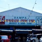 The Dampa Wet Market, featuring fresh-caught seafood and Colt. 45 malt liquor.