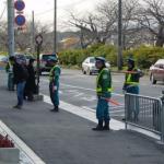 An action shot of wavers in action. Notice that there are 4 of them. This is at the exit to a shopping mall. I think we could cut our unemployment in half if we did this. But could we find people willing to be great wavers?